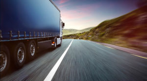 Trucking going down highway - Trucking & Transportation