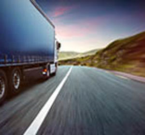 Trucking going down highway - Trucking & Transportation