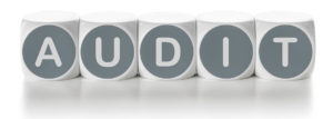 Letter dice on a white background - Audit