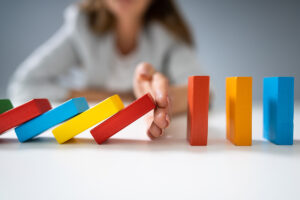 photo of blocks symbolizing reduction in workforce